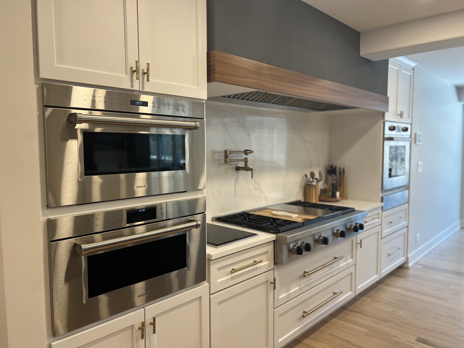 Integrated appliance wall and custom cabinetry in Lisle kitchen renovation