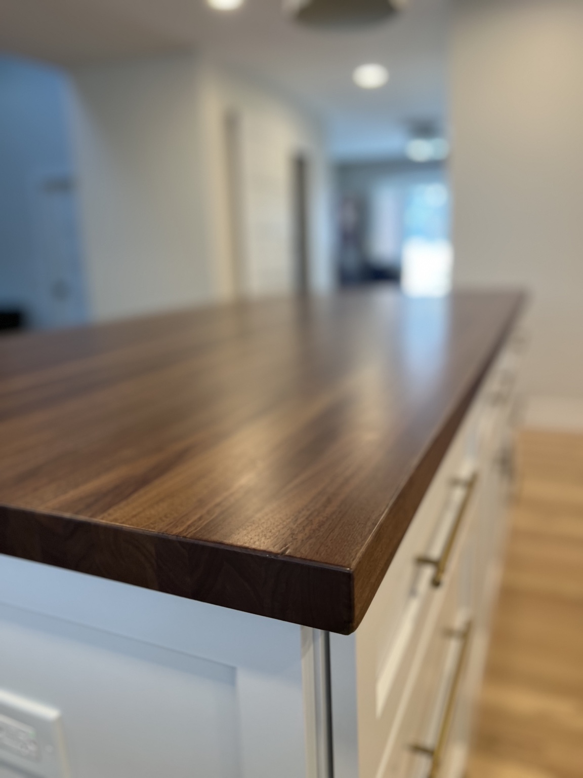 Custom walnut countertop detail in whole-home renovation