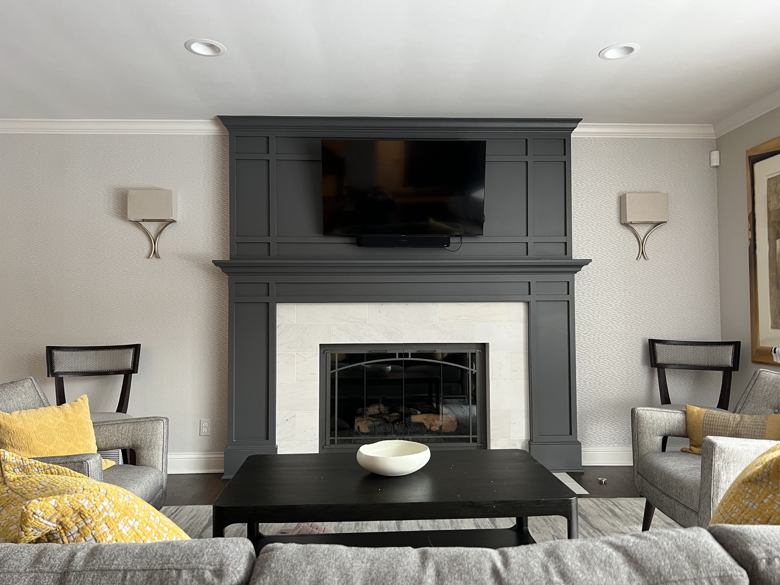 Finished custom fireplace and millwork renovation