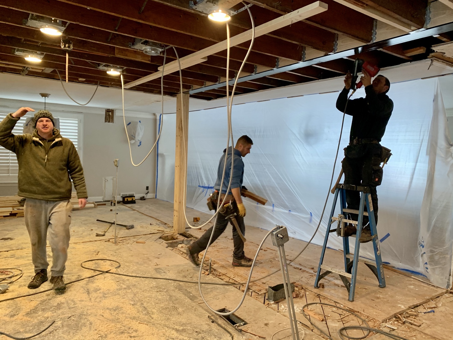 Structural steel installation during major Naperville home renovation